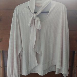 Striped blouse with tie able bow.
